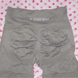 pcheebum gym shorts in color dark blue and stone .